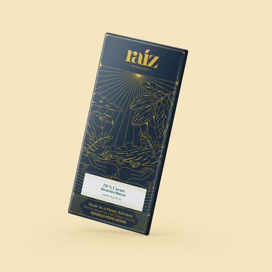 Chocolate bar packaging with 'raiz' branding on a beige background. Label says "Almendra Blanca" or "White Almond" and it's 70% cacao.