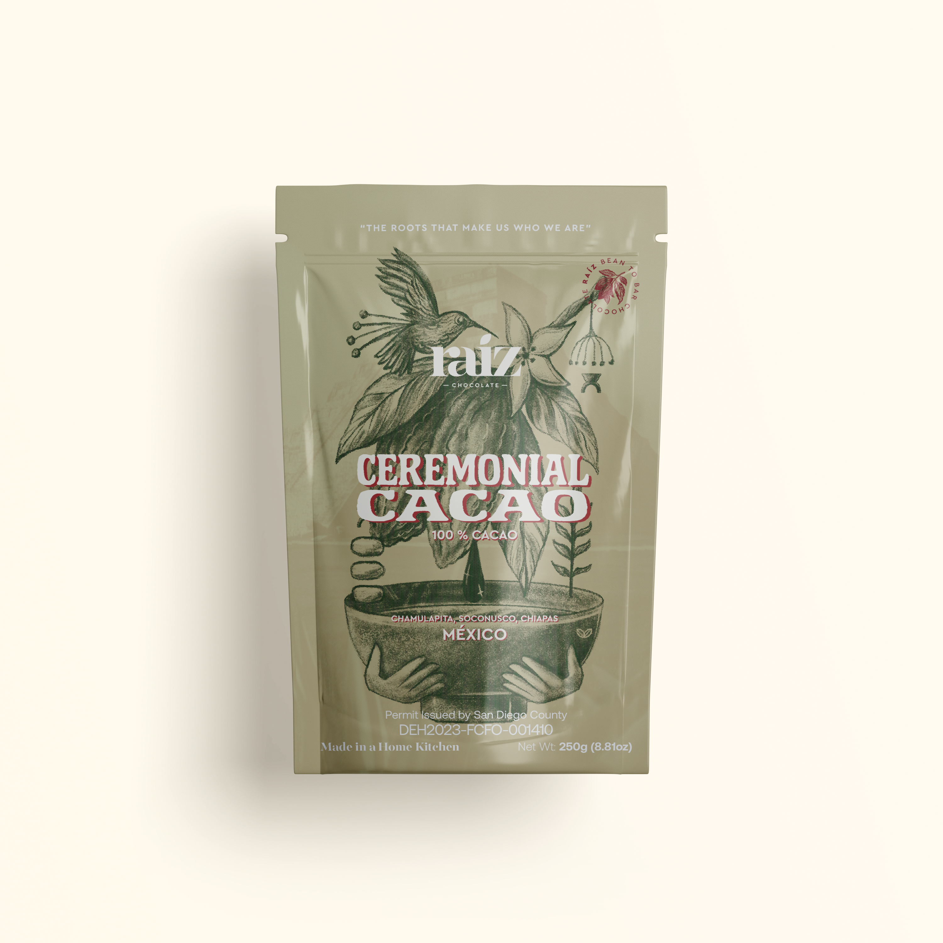 Package of ceremonial cacao with branding on a light beige background
